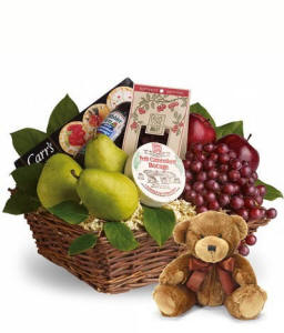 Fruit basket with apples, oranges and a plush teddy bear for same-day gift basket delivery